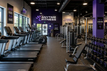 Inside an Anytime Fitness gym showing cardio machines and strength equipment
