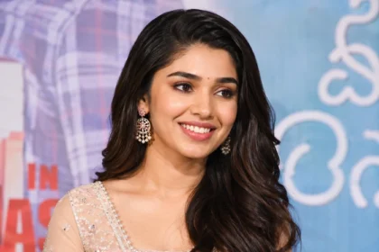 Krithi Shetty smiling at a movie promotion event